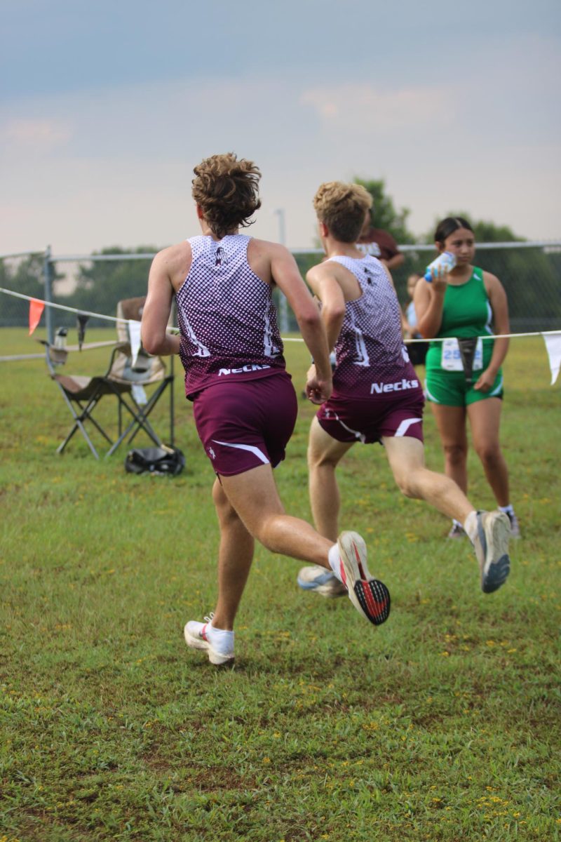 Cross country runners pace each at the Gilmer meet on Aug. 23.